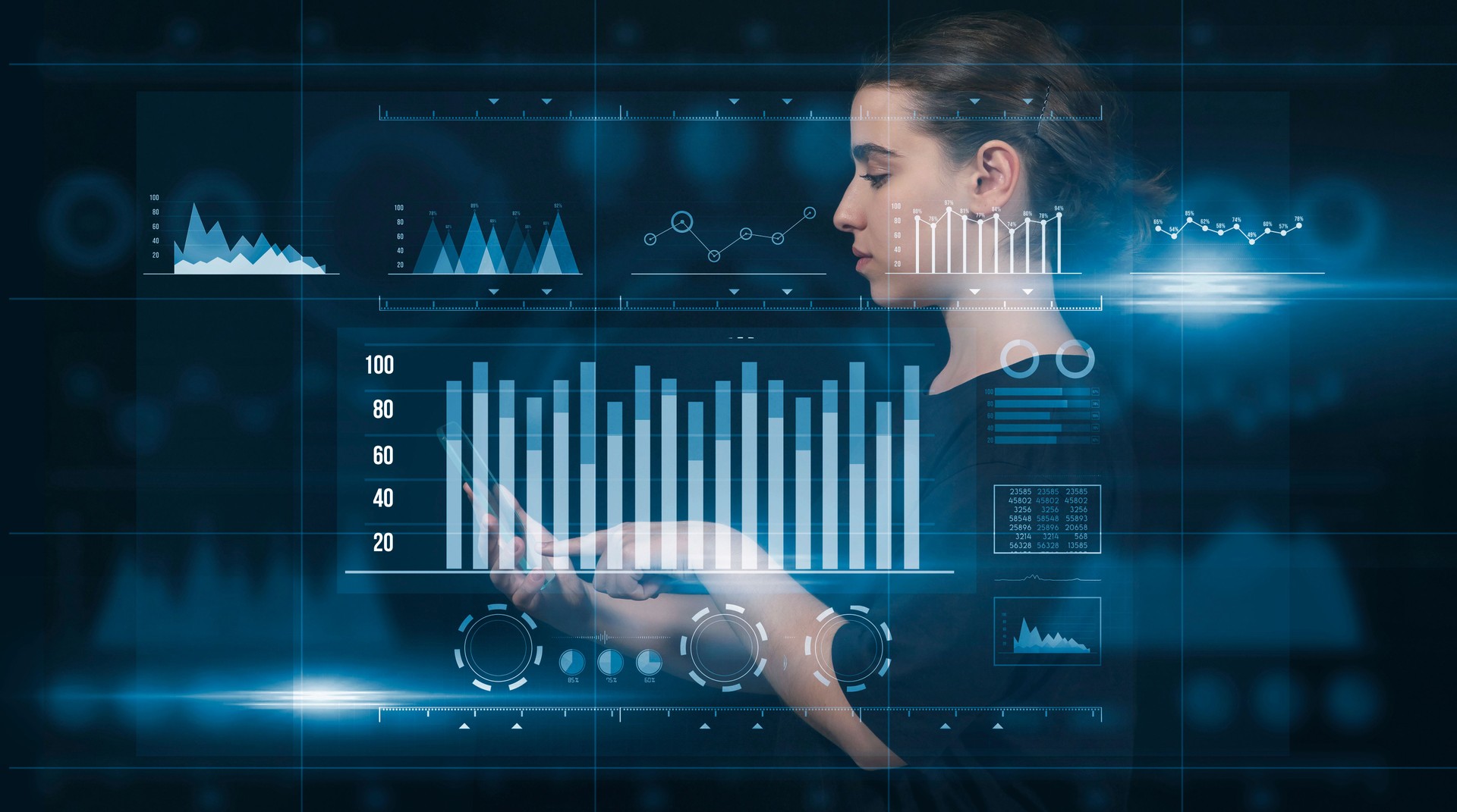 A scientist, businesswoman looking at the charts to analyze the data. She is looking at the smart tablet screen. Virtual Reality has taken place in the business world. This is a futuristic photo. High-Tech, Augmented Reality, Virtual Reality Concept.